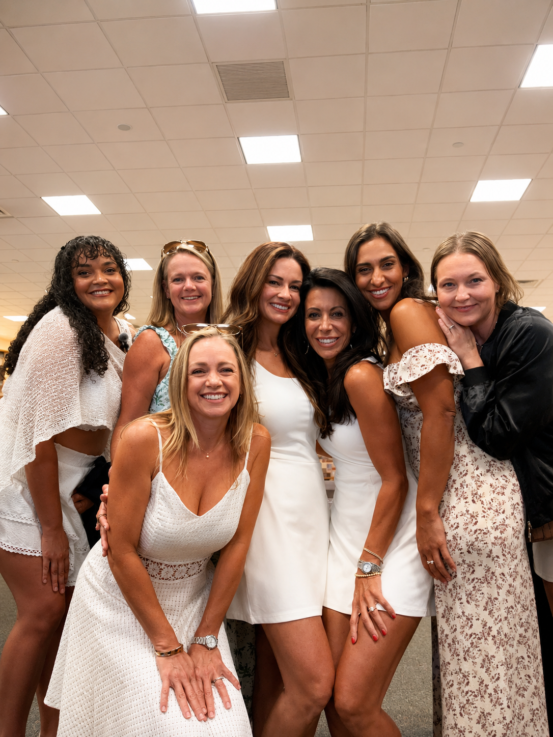 The Book Fetish Mommas gathered together for a group photo inside the bookstore