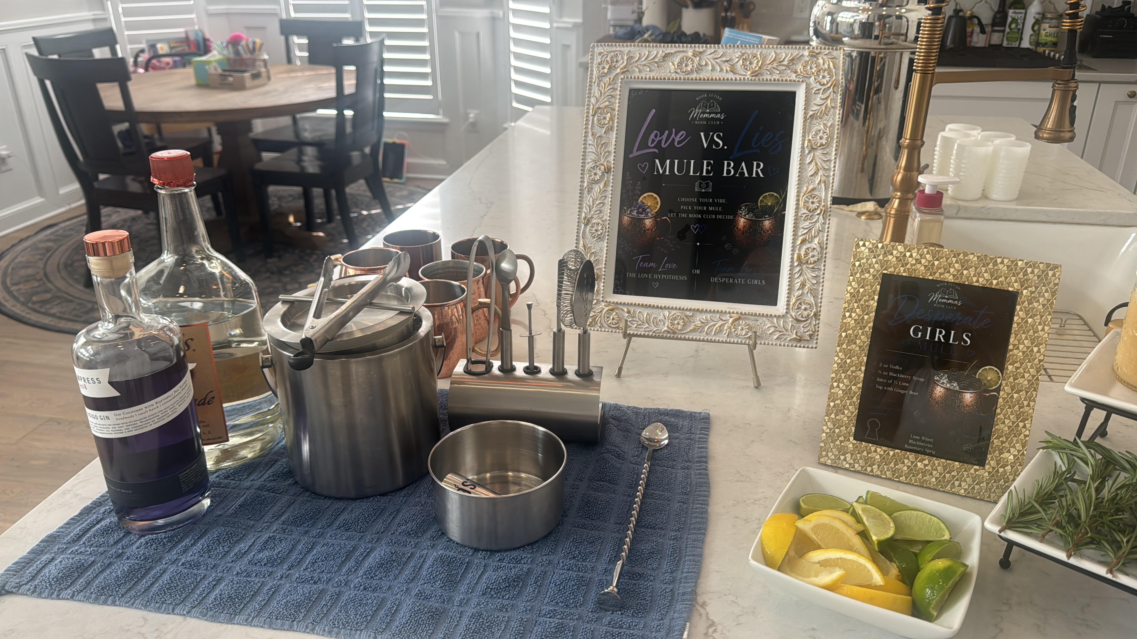 The Blackberry & Lavender Moscow Mule Bar setup at Pillars of Vices, with Love vs. Lies mule bar signage